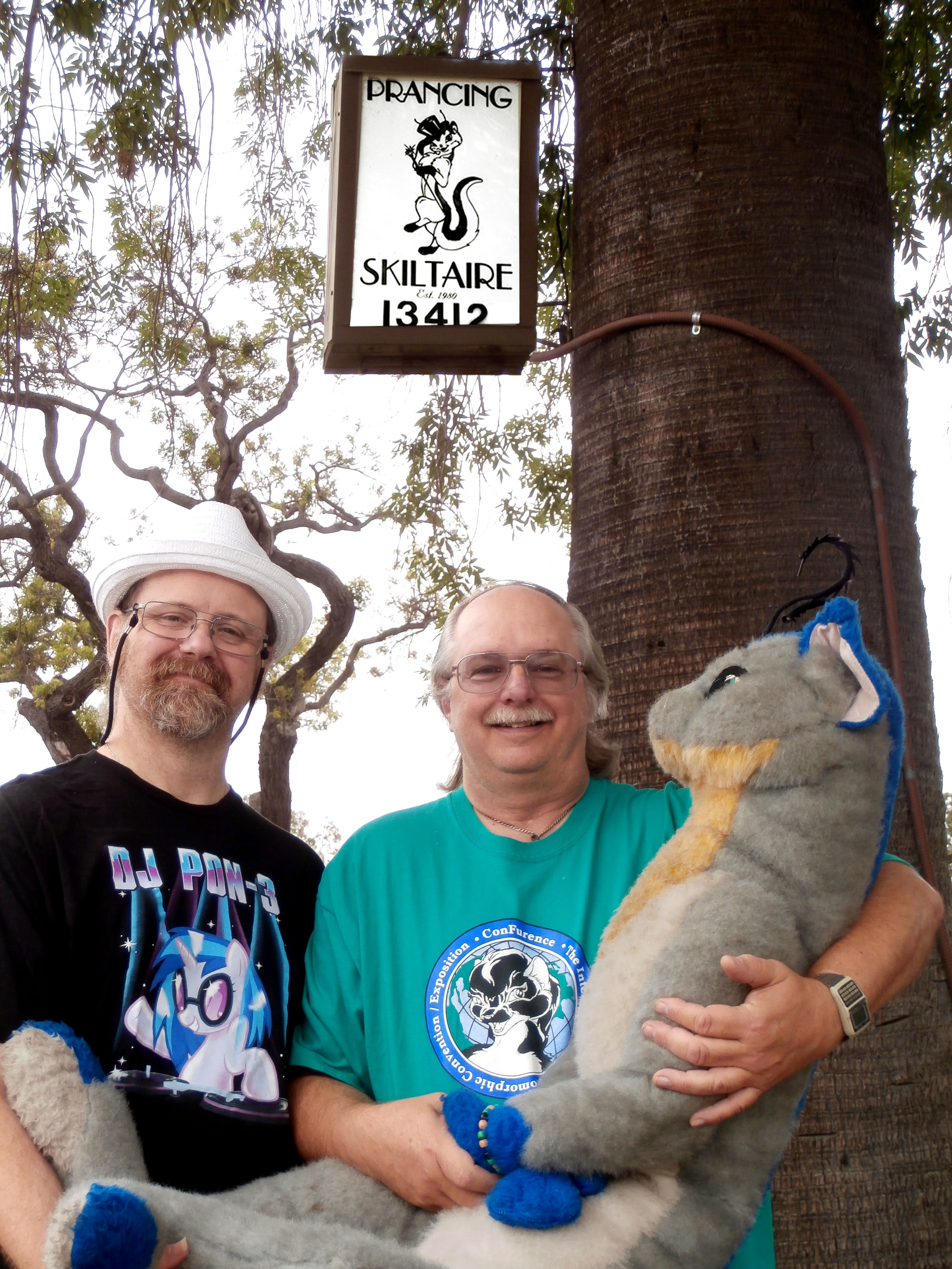 Rod O'Riley, Mark Merlino and a Skiltaire in front of "The Prancing Skiltaire," Garden Grove CA